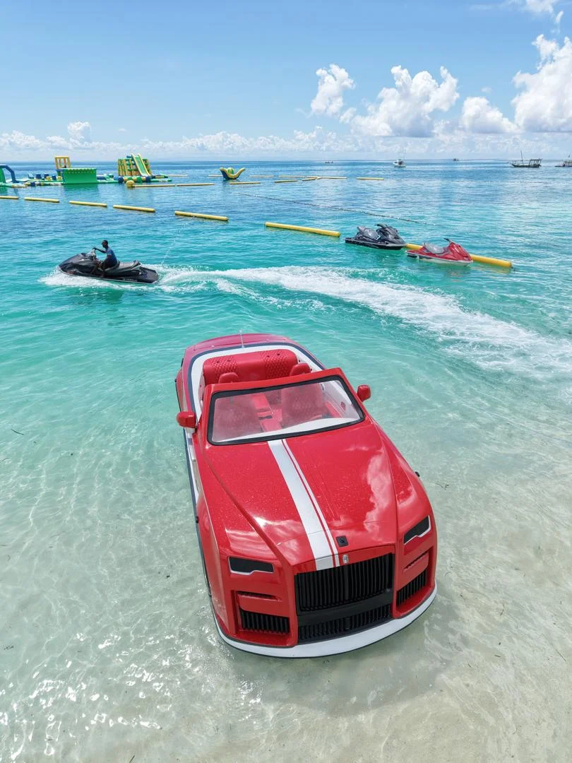 Yellow car boat on water